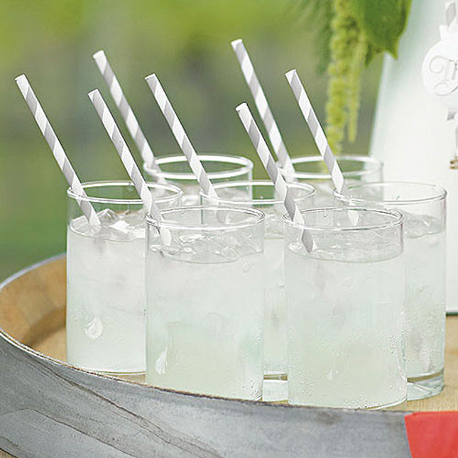 Glasses of lemonade with silver Candy Striped Paper Straws,