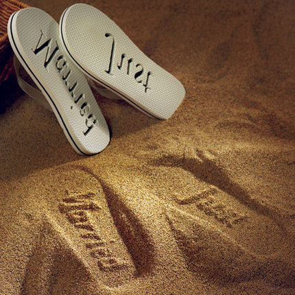 The sand imprint of the Beach Wedding Just Married Flip Flop Wedding Favors 