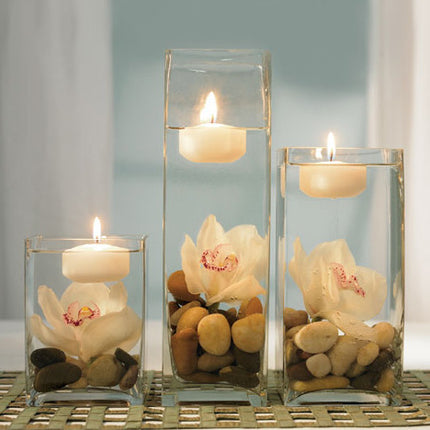 The floating candle, shown as an example of a centerpiece. (other items sold separately)