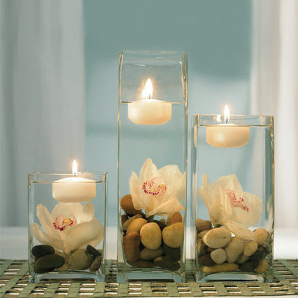 Examples of the floating candles as an addition to a centerpiece. (other items sold separately)