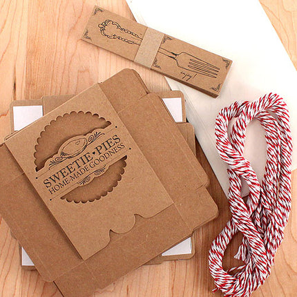 The Mini-Pie Wrapping Kit for Wedding Favors, includes pie boxes, pre-cut twine, tags, and wax sheets.
