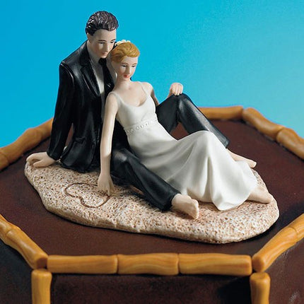 Bride and Groom Sitting on Beach Sand Wedding Cake Topper